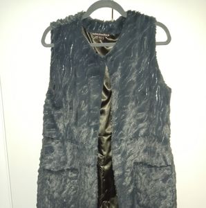 Mushkaby Sienna Rose, Inc.. Hip length faux fux vest with sequins!